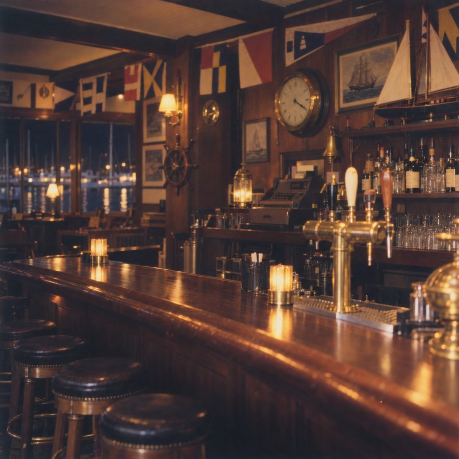Instant photo of the yacht club bar with a clock over the register